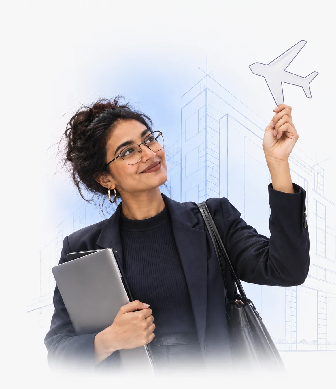 A woman holding a laptop and an airplane cutout
